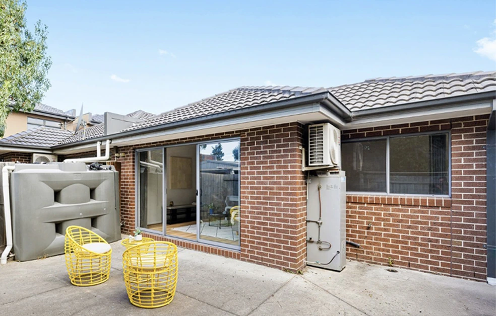 Front exterior view of purchased Albion property secured below market value