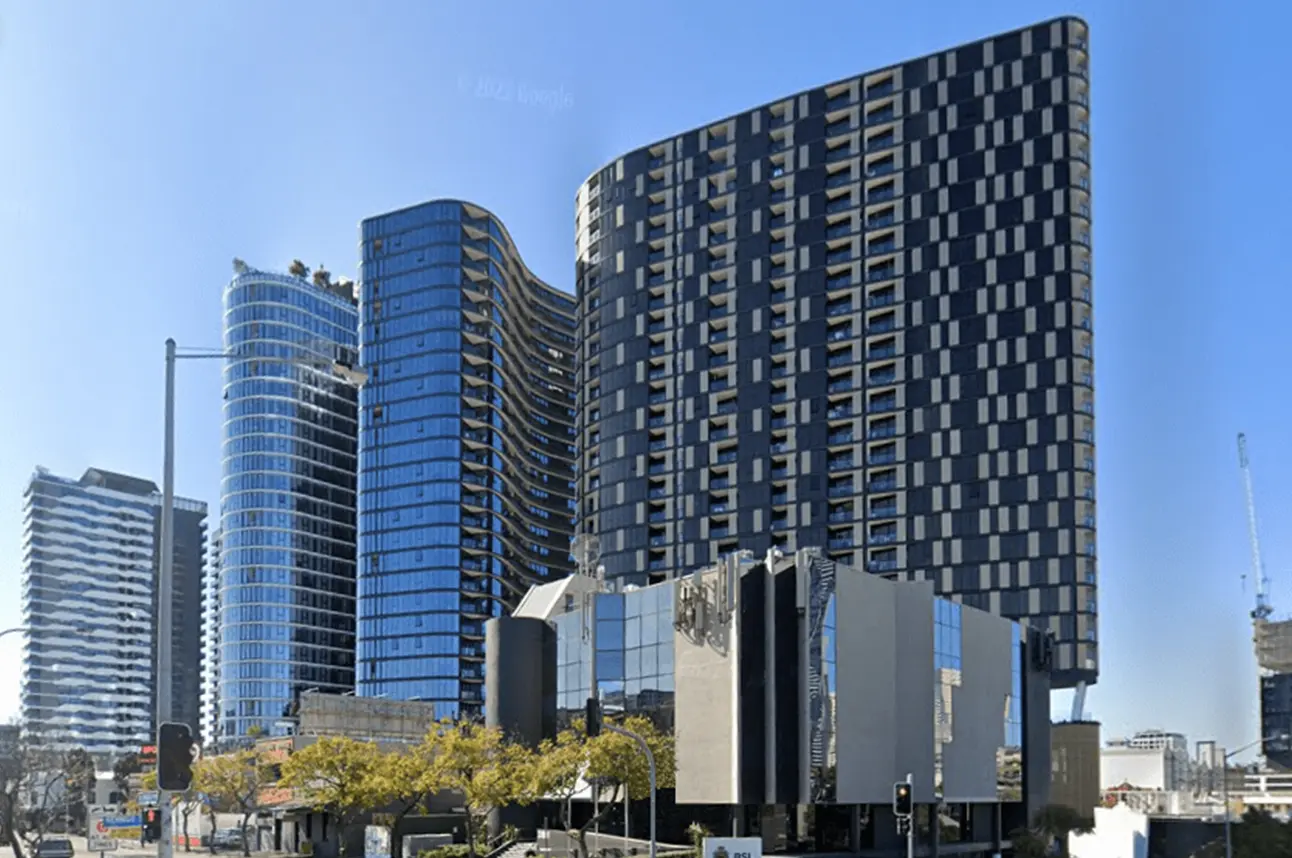 Modern high-rise apartment towers with curved glass facade