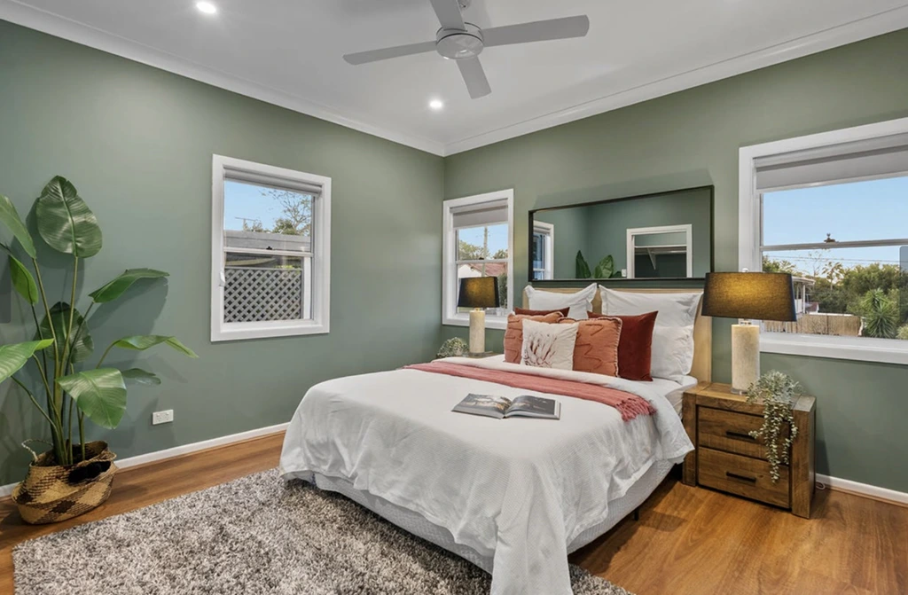 Bright and cozy bedroom in renovated Mansfield family home purchased pre-auction in Brisbane