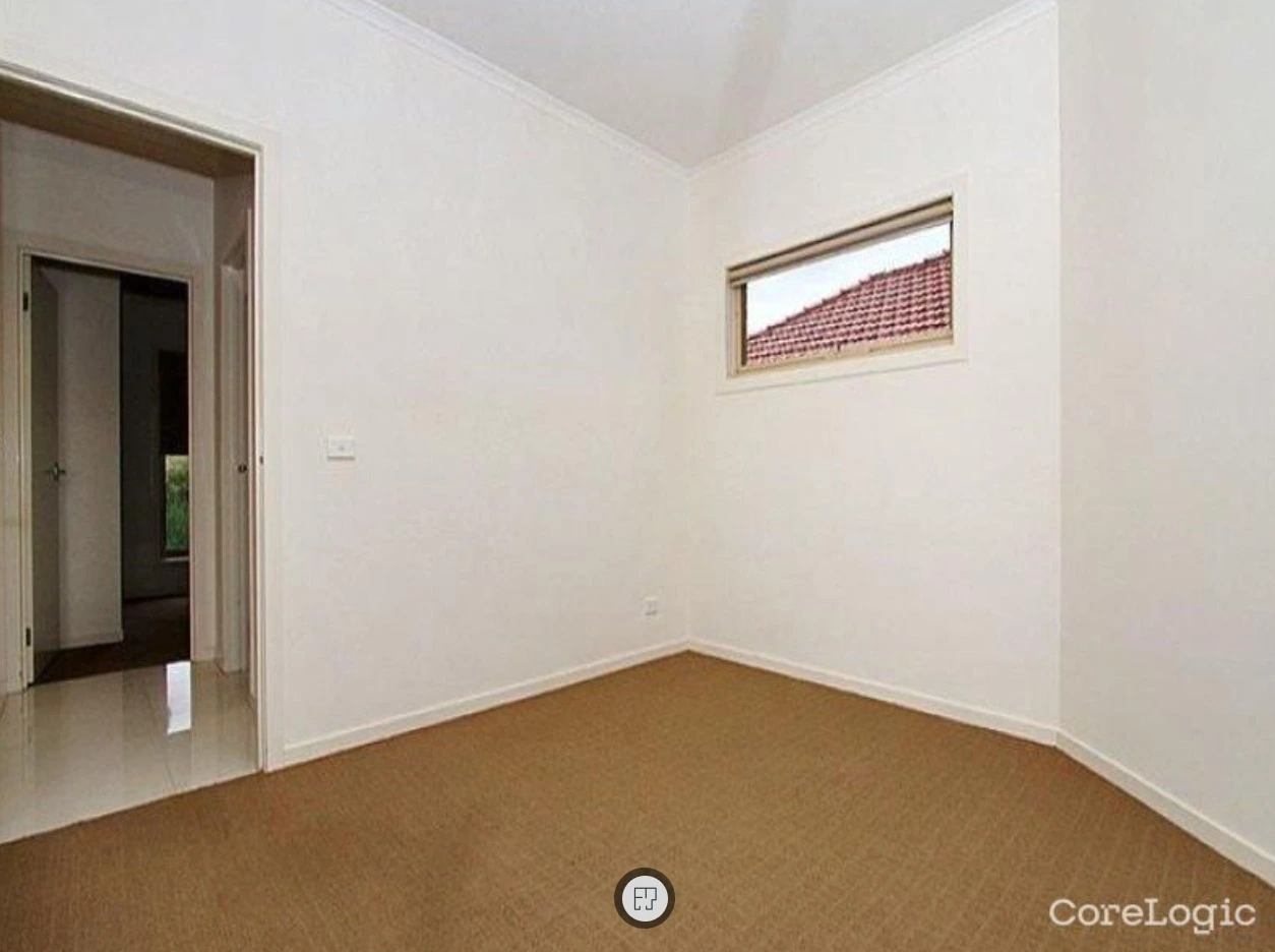 master bedroom before renovation in Reservoir pre-market property with carpet flooring and high window