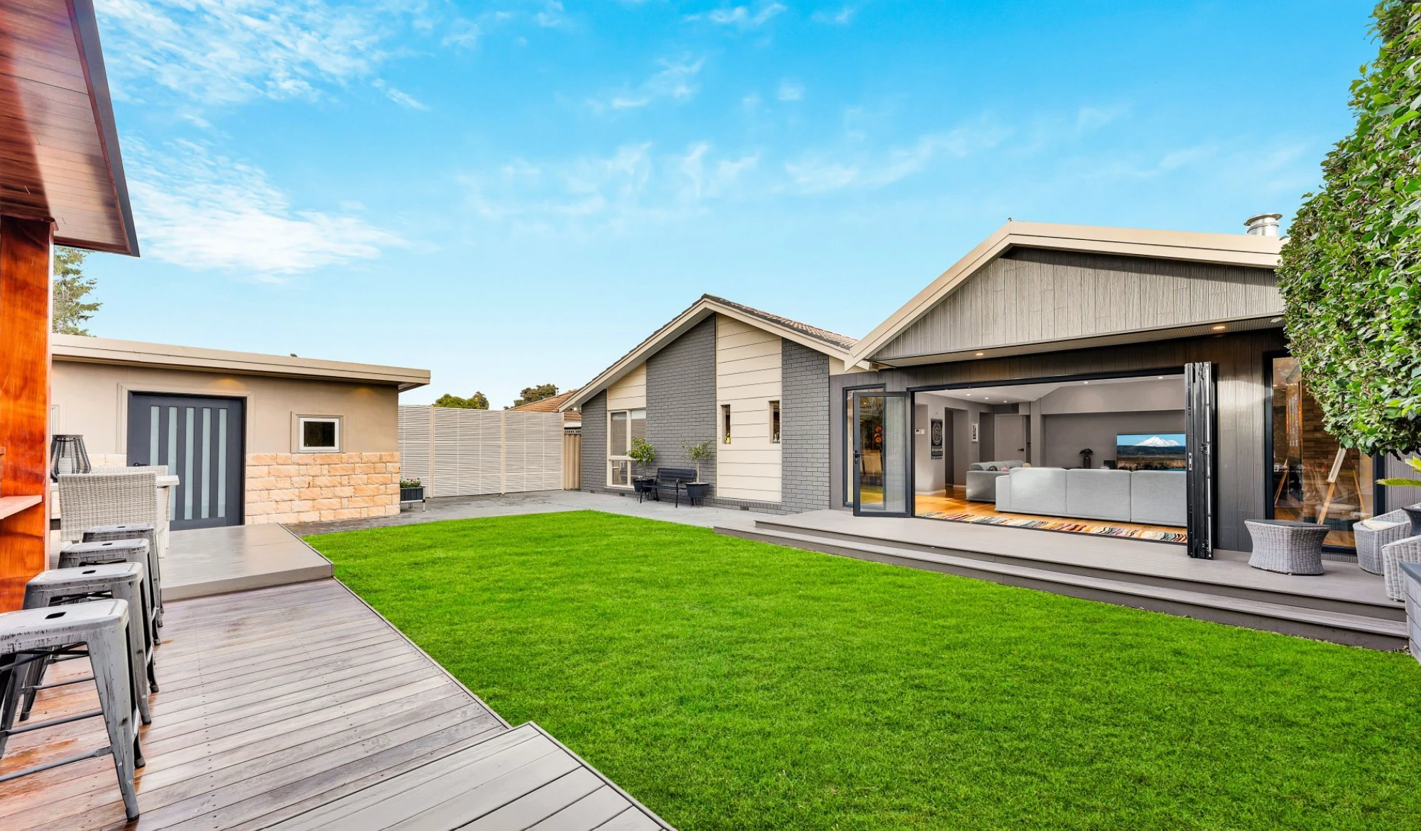 Spacious grassy backyard in Mill Park home ideal for family living and outdoor activities