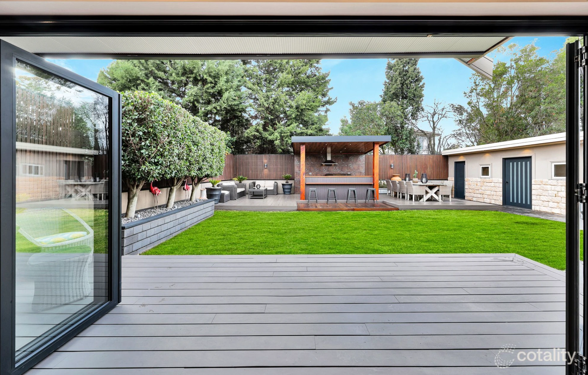 Spacious Mill Park backyard with outdoor entertaining area and landscaped garden