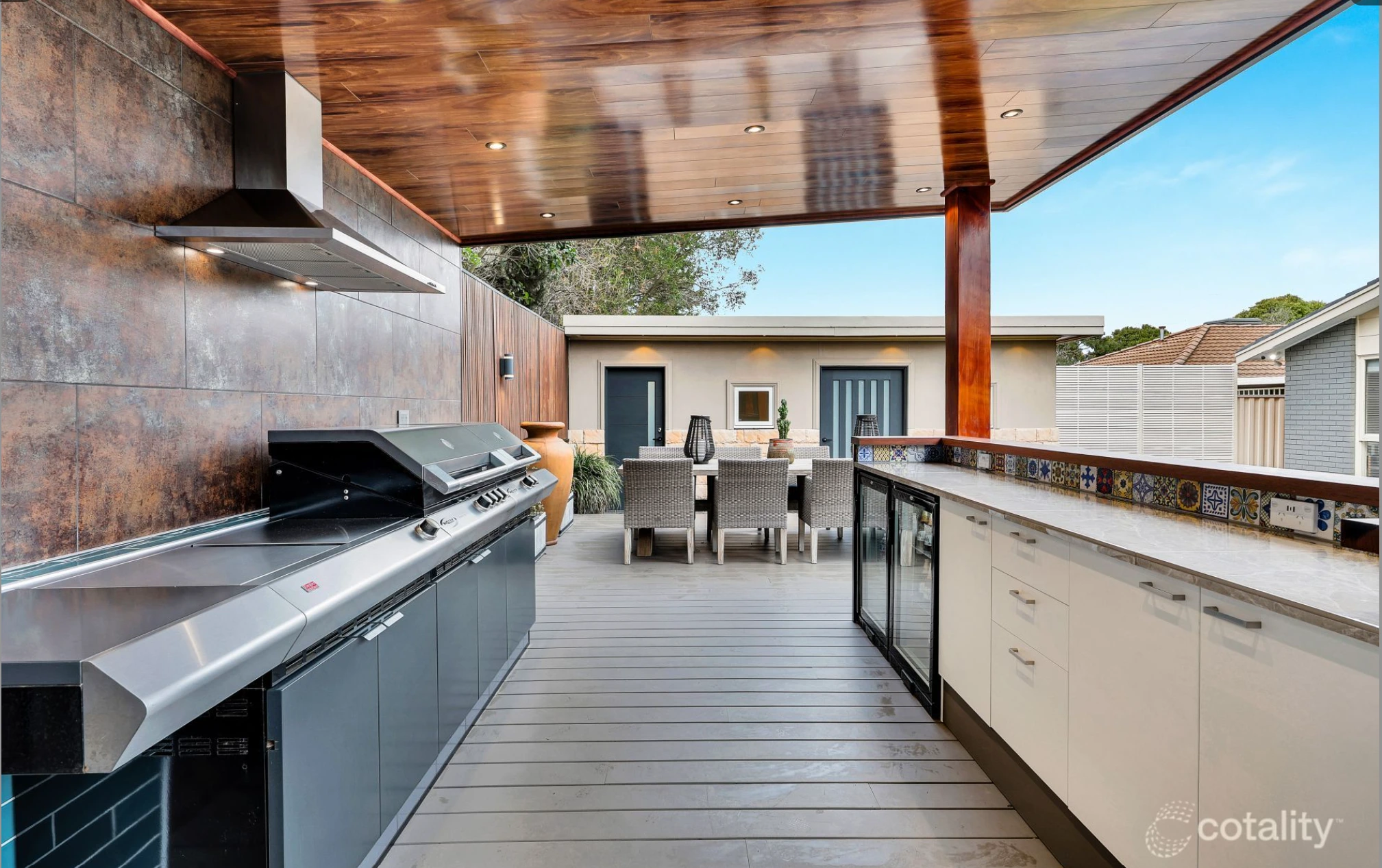 Outdoor BBQ area in Mill Park home with covered dining space and modern setup for entertaining