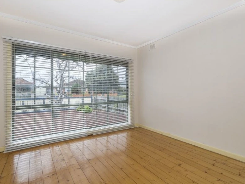 Bedroom interior of the St Albans property highlighting natural light and renovation potential.