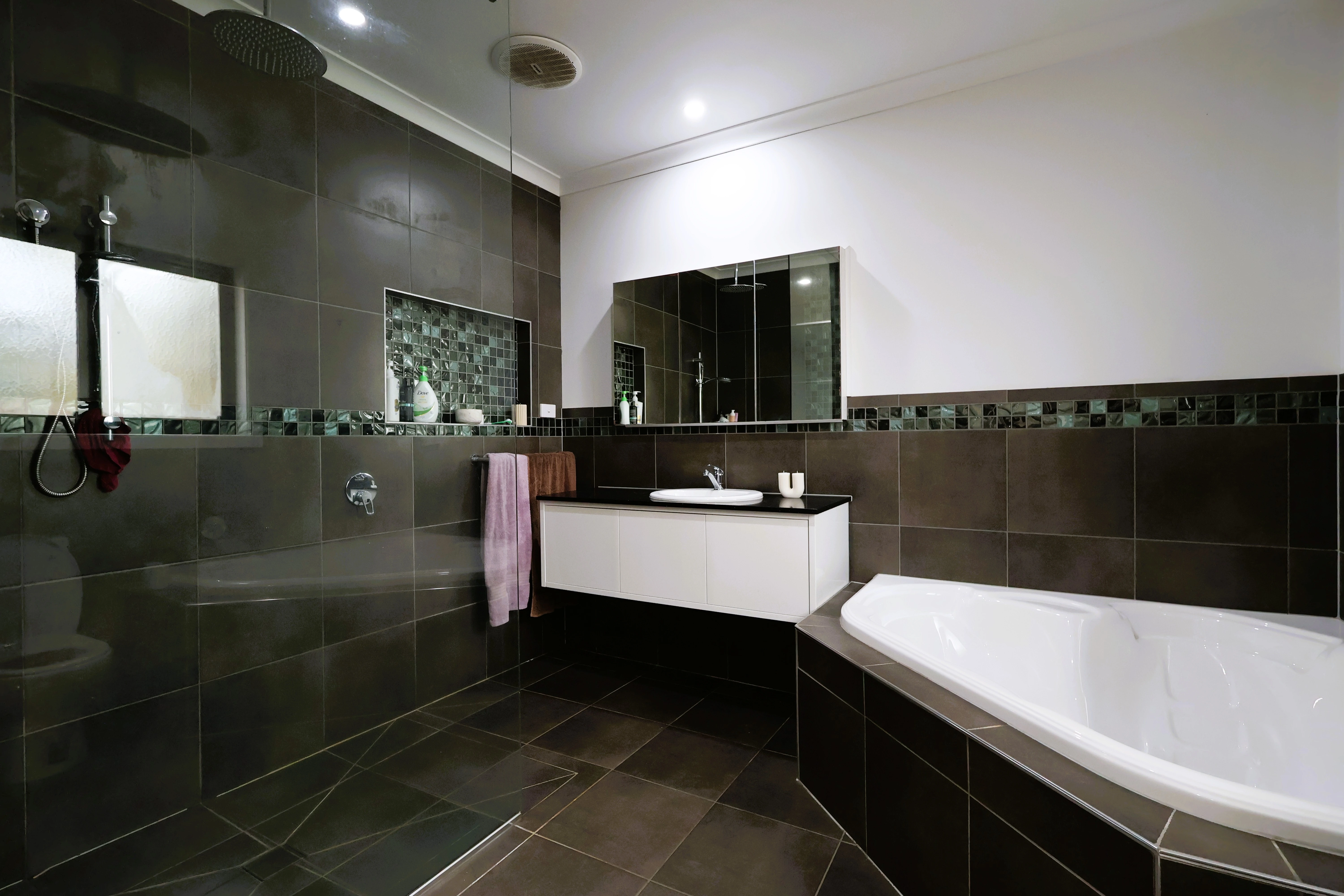 Spacious living room of the Traralgon property showcasing natural light, modern decor, and a welcoming atmosphere.