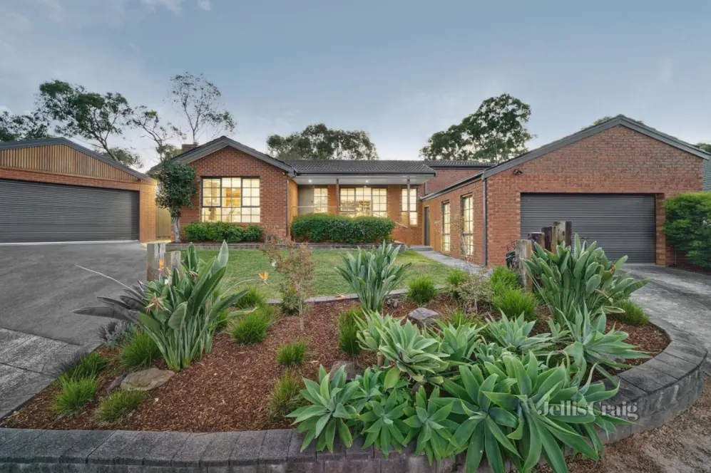 Modern brick house with native garden and double garages